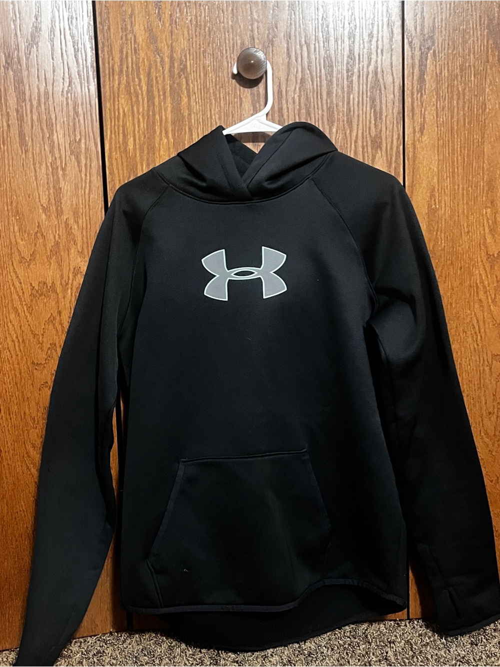 Under Armour Women’s hoodie. Black with teal details